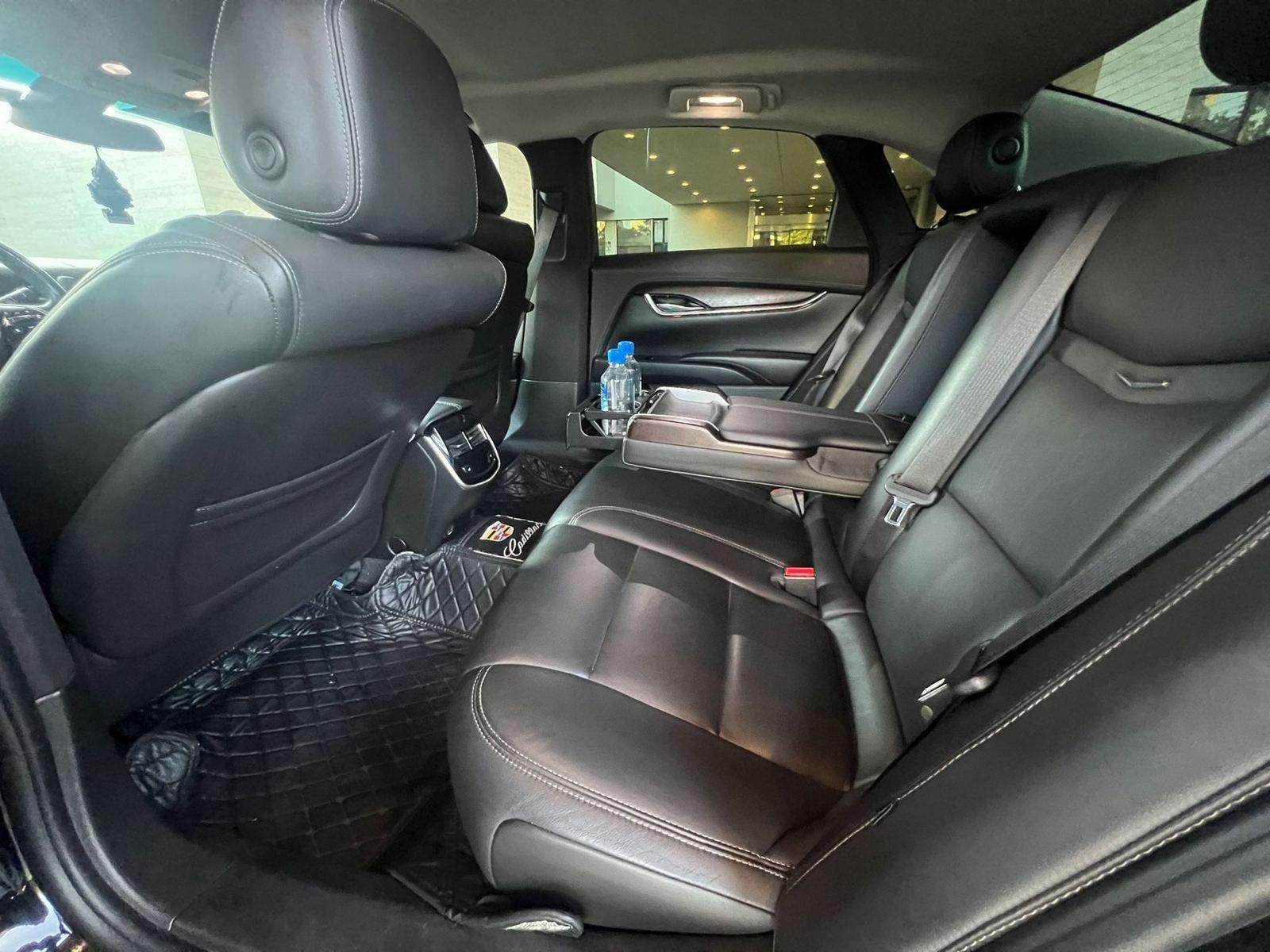 Cadillac XTS sedan rear seats interior — Houston Limo Chauffeur