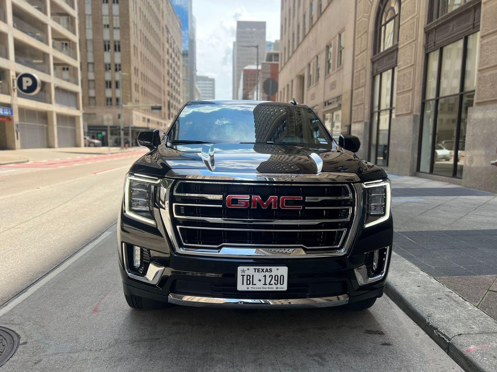 GMC Yukon Denali front downtown — Houston Limo Chauffeur