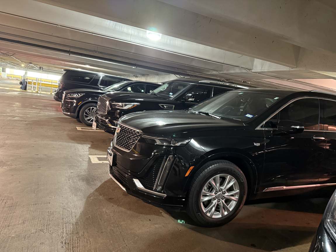 IAH Bush Intercontinental Airport garage Cadillac XT6 lineup — Houston Limo Chauffeur