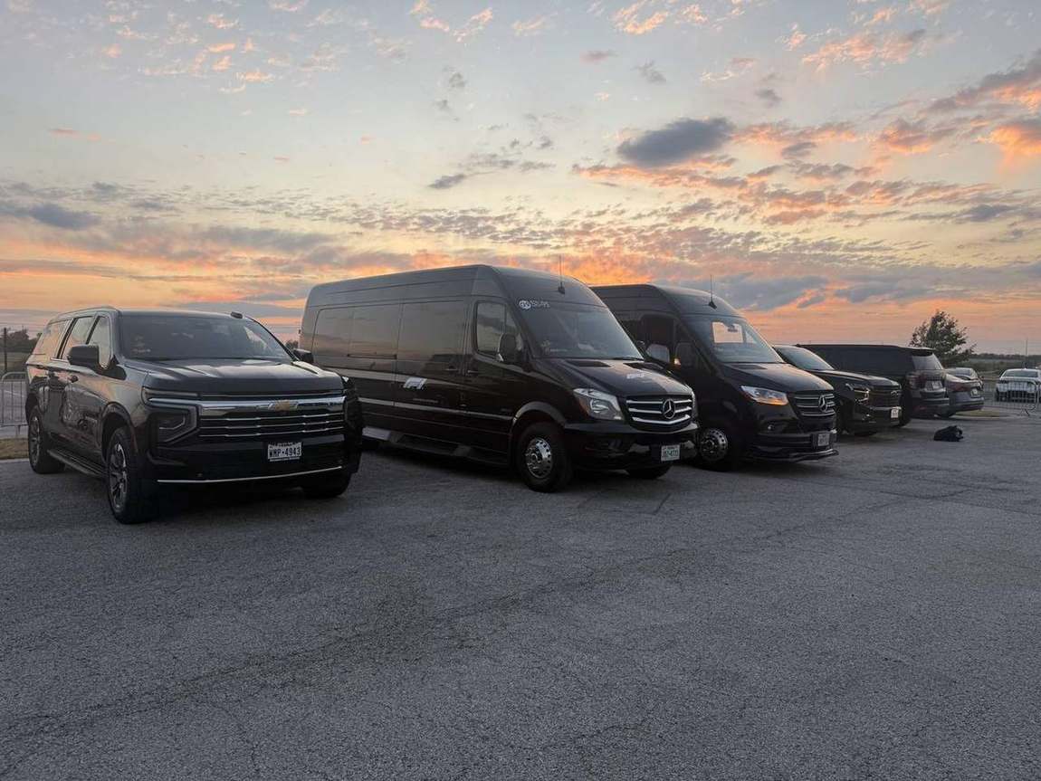 Mercedes Sprinters sunset — Houston Limo Chauffeur