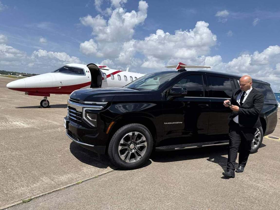 Chevy Suburban private jet chauffeur — Houston Limo Chauffeur