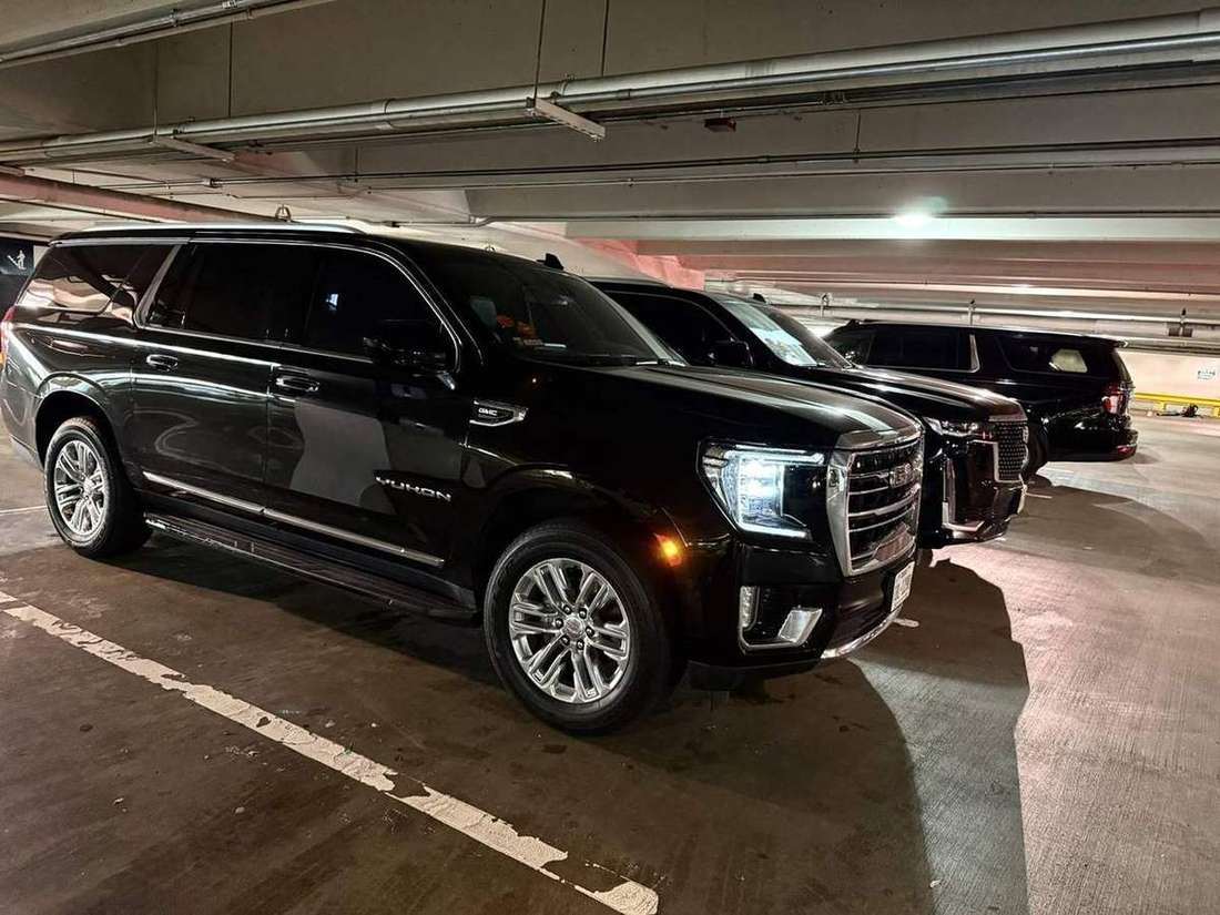 Yukon Cadillac Escalade garage — Houston Limo Chauffeur