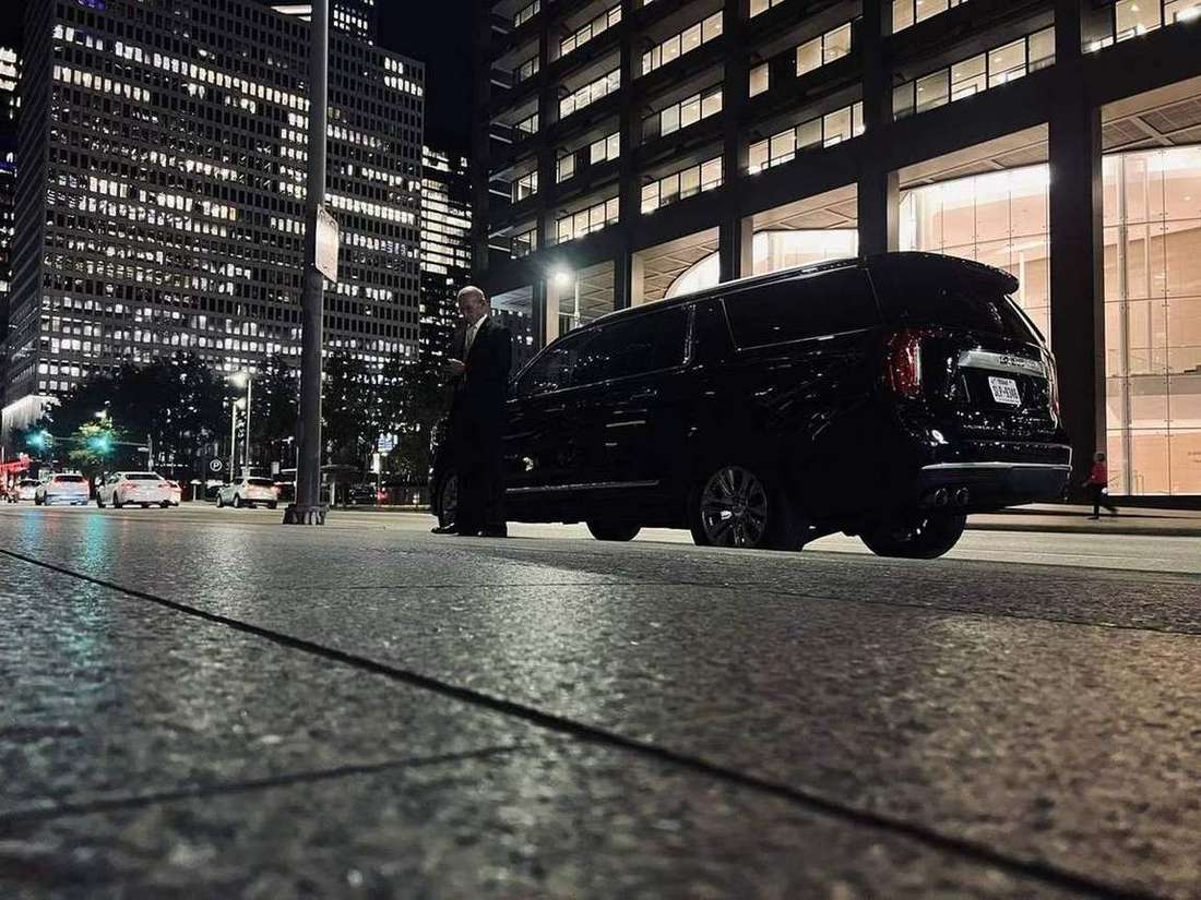 Yukon night downtown — Houston Limo Chauffeur