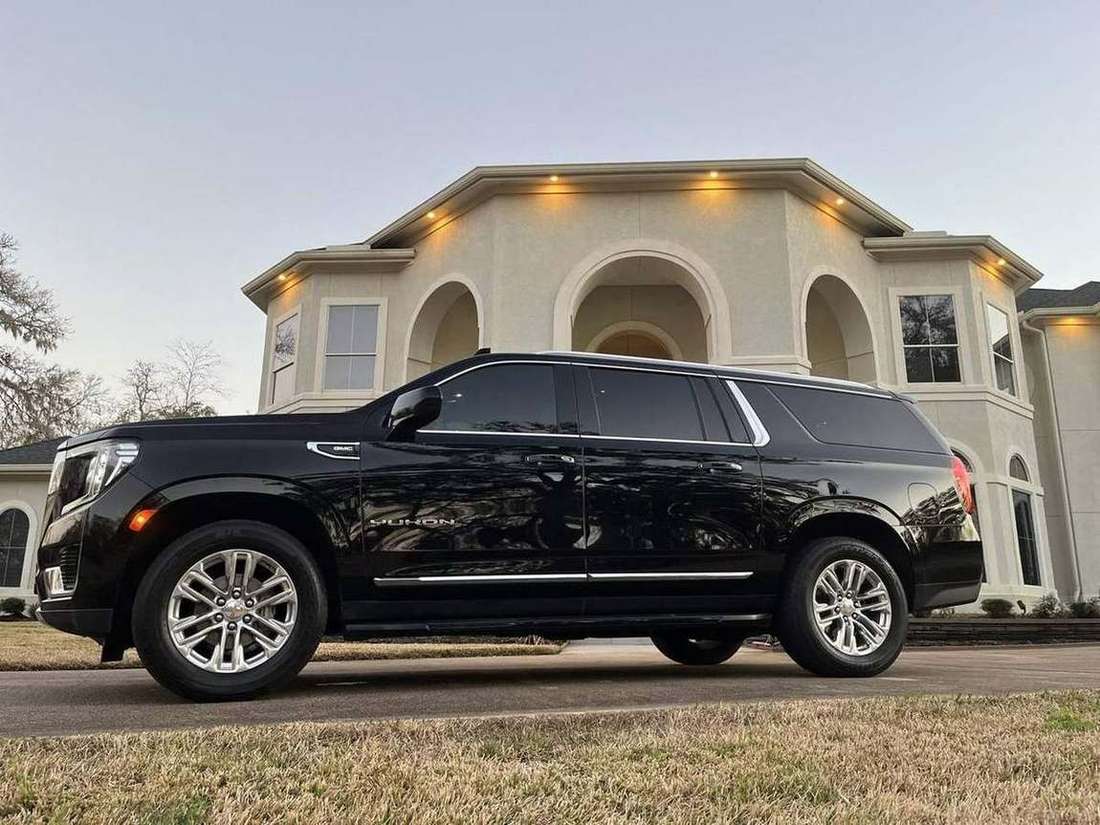 Yukon XL mansion — Houston Limo Chauffeur